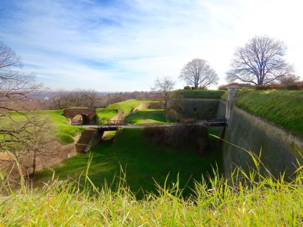 fortress green surroundings with bridges and stairs leading to other parts of fortress